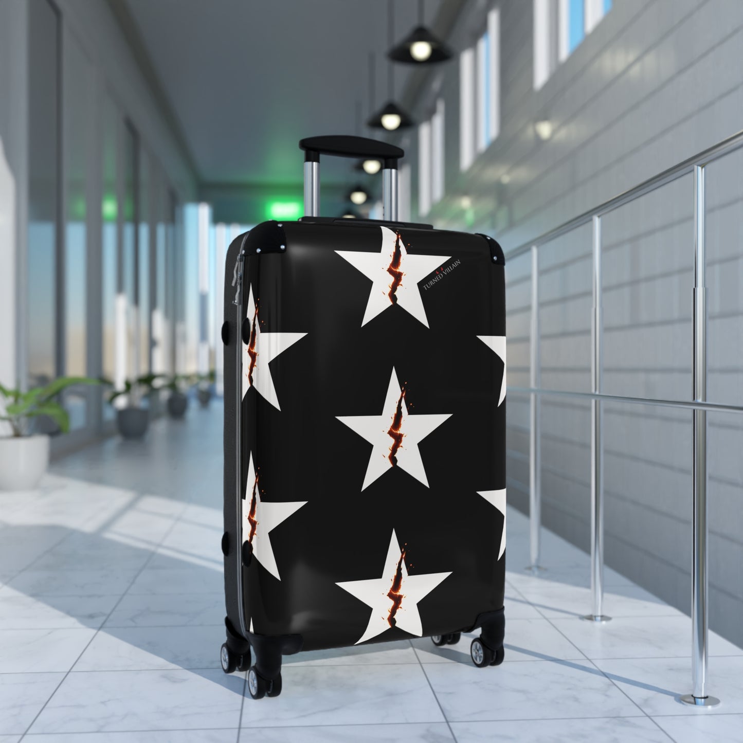 Broken Star Suitcase — Black with Turned Villain logo